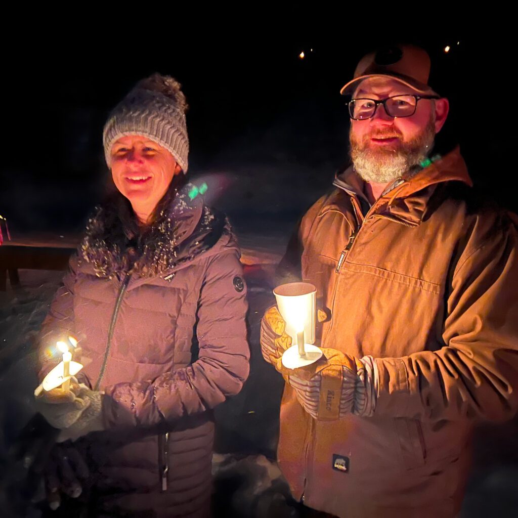 People holding candles during the journey to Bethlehem